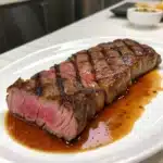New York strip steak sous vide-style, sliced and ready to serve