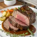 Rib roast cooked to perfection via sous vide, ready for carving